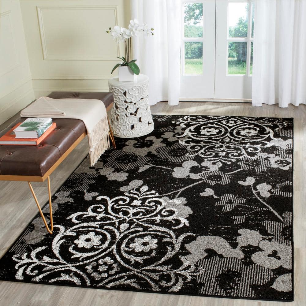 Chic Lodge 6' x 9' Hand-Knotted Black/Silver Synthetic Area Rug