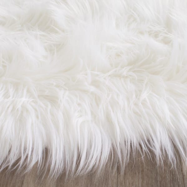 SAFAVIEH Faux Sheepskin Ivory 6 ft. x 6 ft. Round Solid Area Rug FSS235A-6R  - The Home Depot