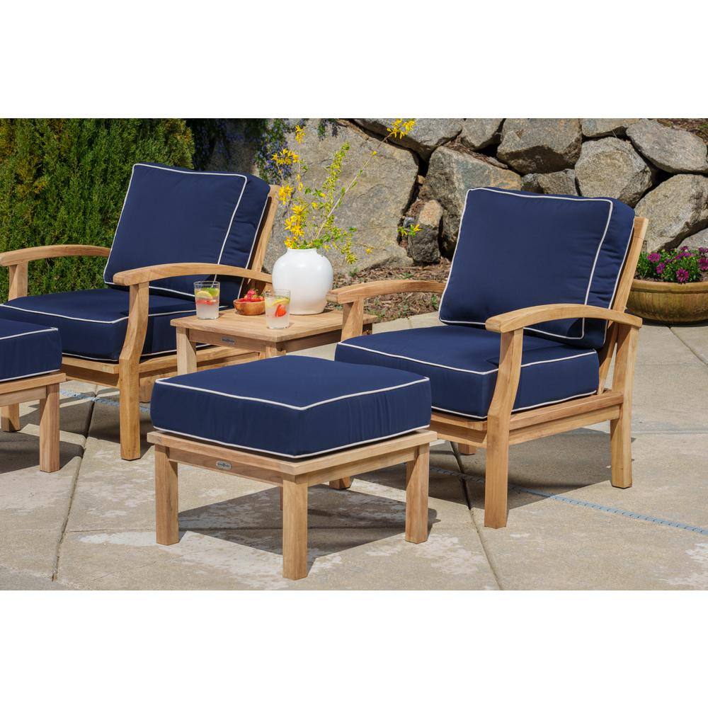 Teak patio set with navy blue cushions