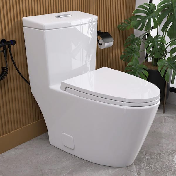 Top 1-Piece Toilet 1.1/1.6 GPF Dual Flush Compact Elongated Toilet in Glossy White Soft Close Seat Included