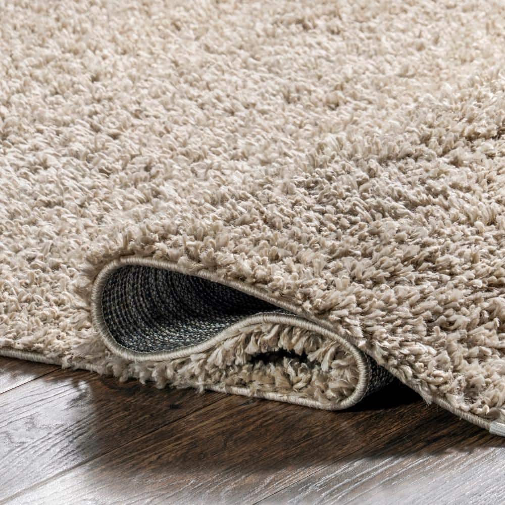 Braided Beige Rectangular Shag Area Rug with Tassels