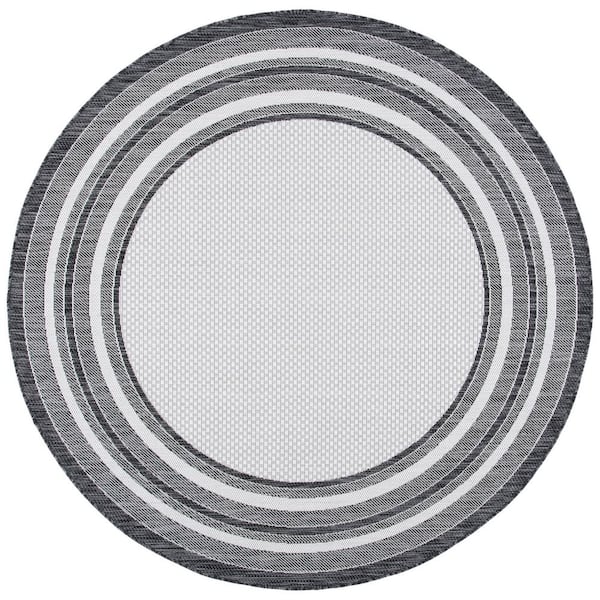 SAFAVIEH Courtyard Ivory/Black 9 ft. x 9 ft. Round Solid Color Striped Indoor/Outdoor Area Rug
