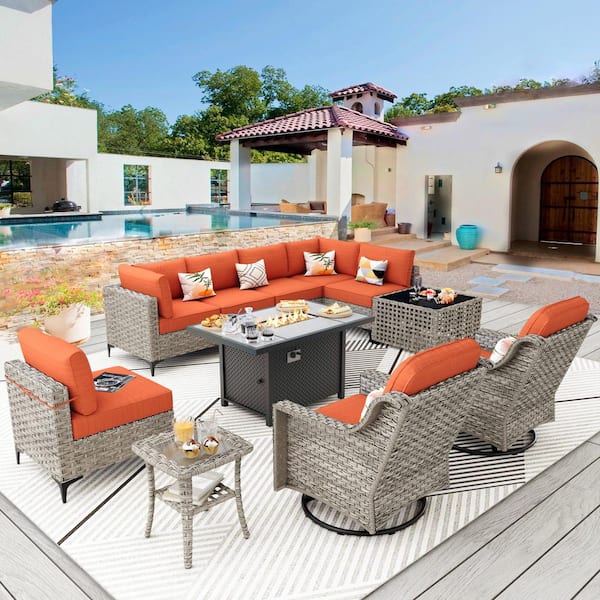 XIZZI Apollo 11-Piece Wicker Rectangular Fire Pit Sets and Swivel Rocking Chairs with Orange Red Cushion