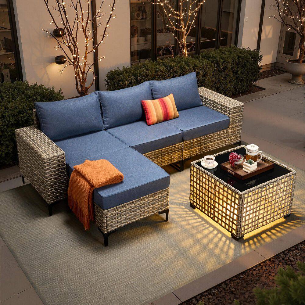 Versa 5-Piece Wicker Outdoor Sectional Sofa Set with Ottoman, Solar Lighted Coffee Table and Denim Blue Cushions