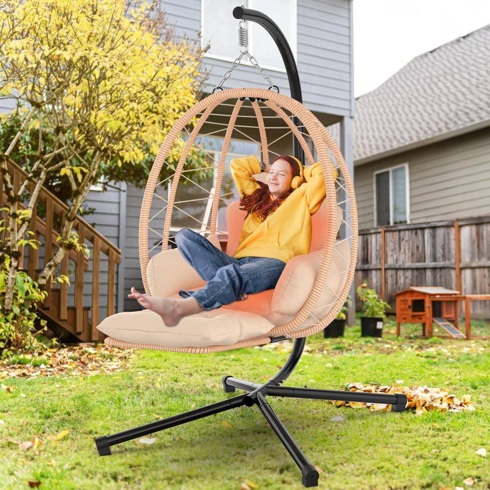 Brown Heated Hanging Egg Chair with Cushions and Black Steel Frame