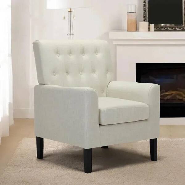 white tufted armchair