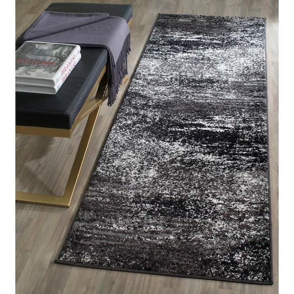Adirondack Silver/Black 3 ft. x 20 ft. Solid Distressed Runner Rug
