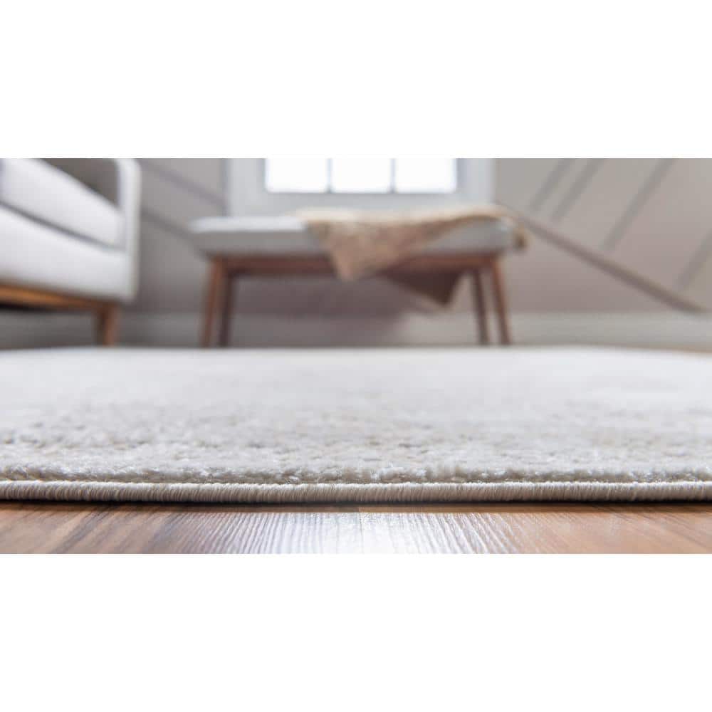 Ivory Medallion Easy-Care 9'x12' Rectangular Synthetic Rug