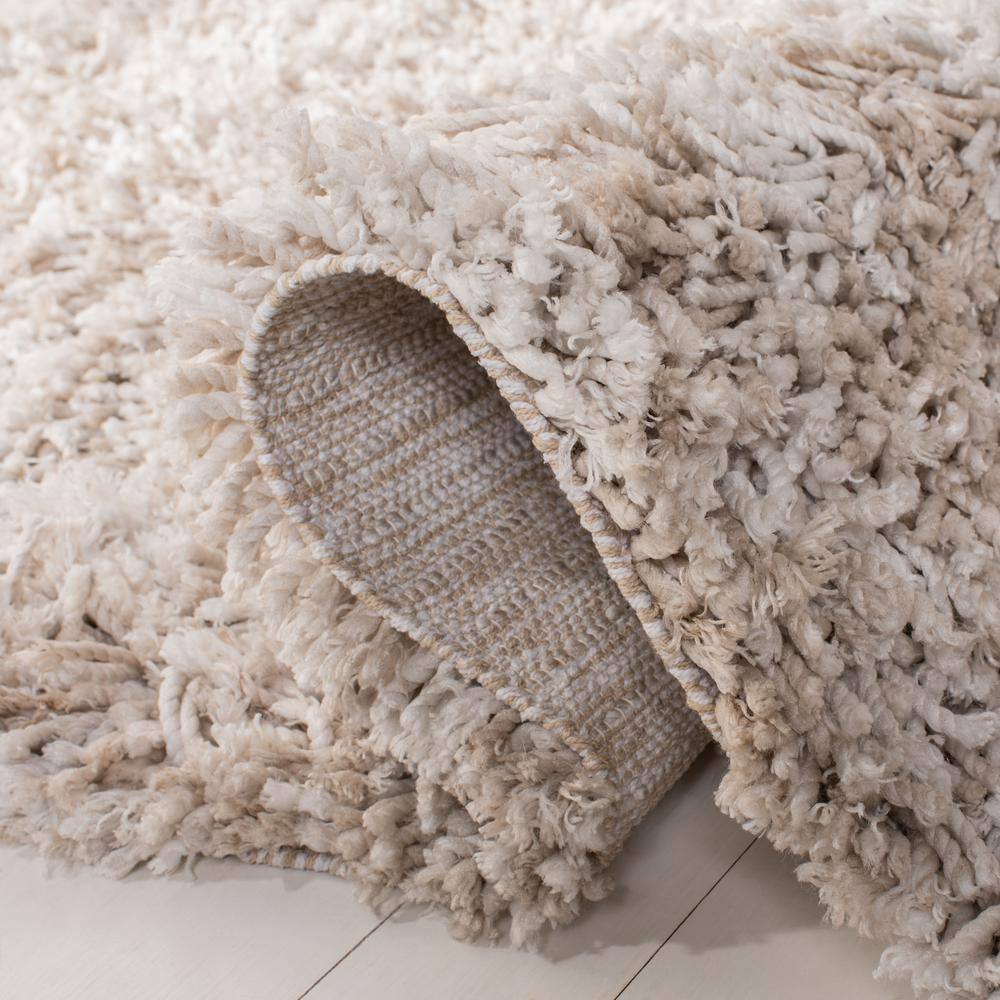 Hand-Tufted Beige/Ivory Synthetic Shag Area Rug, 4' x 6'