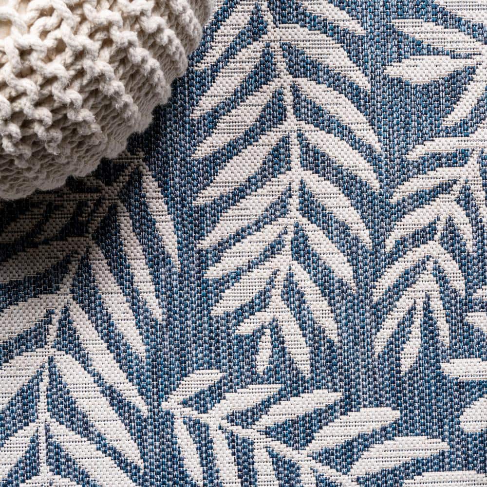5' x 8' Navy and Ivory Palm Frond Indoor/Outdoor Area Rug