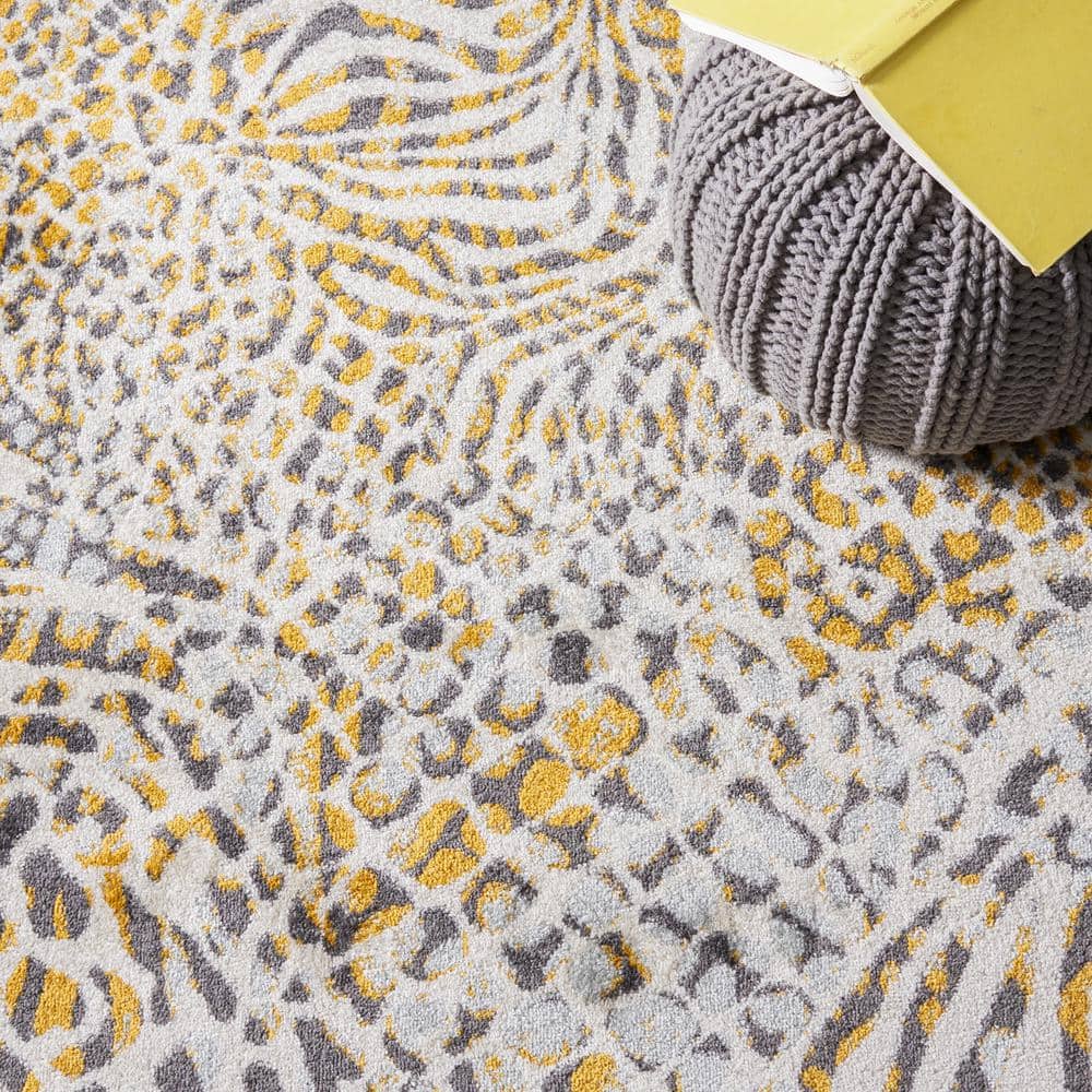 Ivory and Gold Synthetic Round Hand-knotted Rug