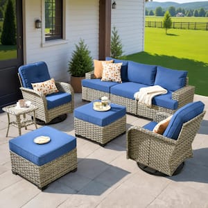 Scorpio 8-Piece Wicker Patio Conversation Seating Sofa Set with Navy Blue Cushions and Swivel Rocking Chairs