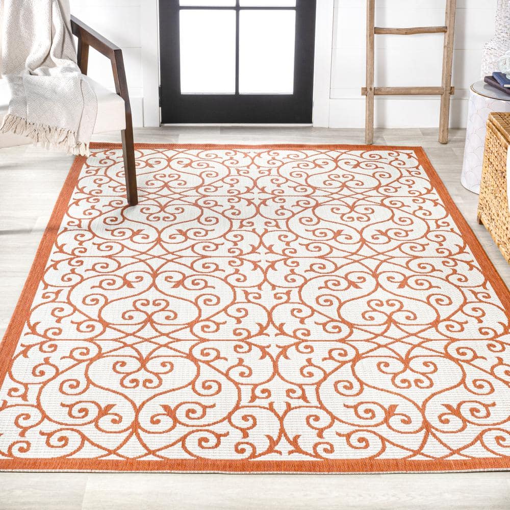 Cream and Orange 8' x 10' Synthetic Flat Woven Reversible Rug