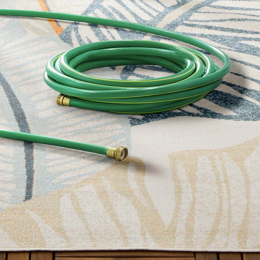 Ivory and Multicolor Synthetic Palm Fronds Indoor/Outdoor Rug
