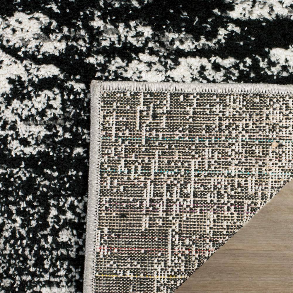 Silver and Multicolor Abstract Synthetic Area Rug