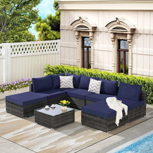 8-Piece Outdoor Wicker Conversation Sets with Dark Blue Cushions and Glass Coffee Table for Garden