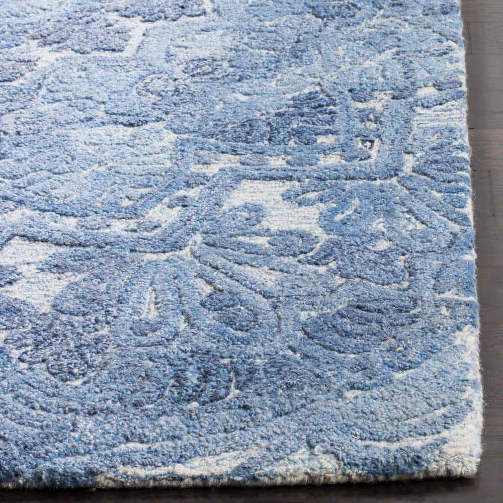 Hand-Tufted Elegance Blue/Ivory Wool 9' x 12' Rug