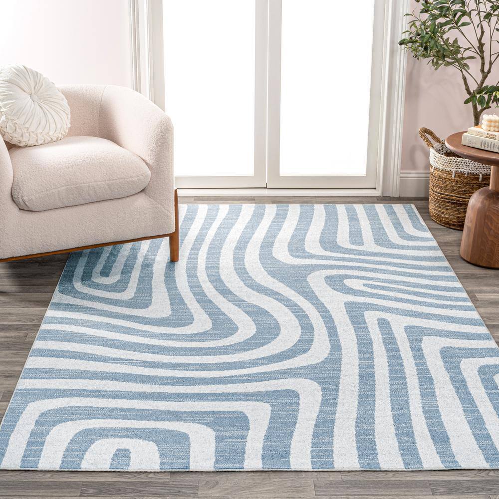 Blue and Cream Abstract Synthetic 4' x 6' Washable Area Rug