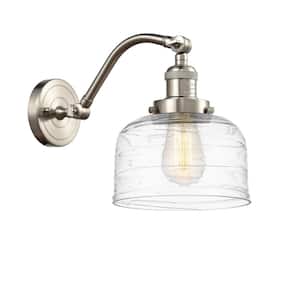 Bell 8 in. 1-Light Brushed Satin Nickel Wall Sconce with Clear Deco Swirl Glass Shade