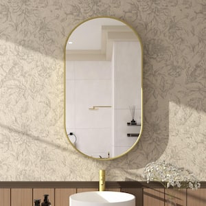 Tax 18 in. W. x 36 in. H Oval Framed Wall Bathroom Vanity Mirror in Gold