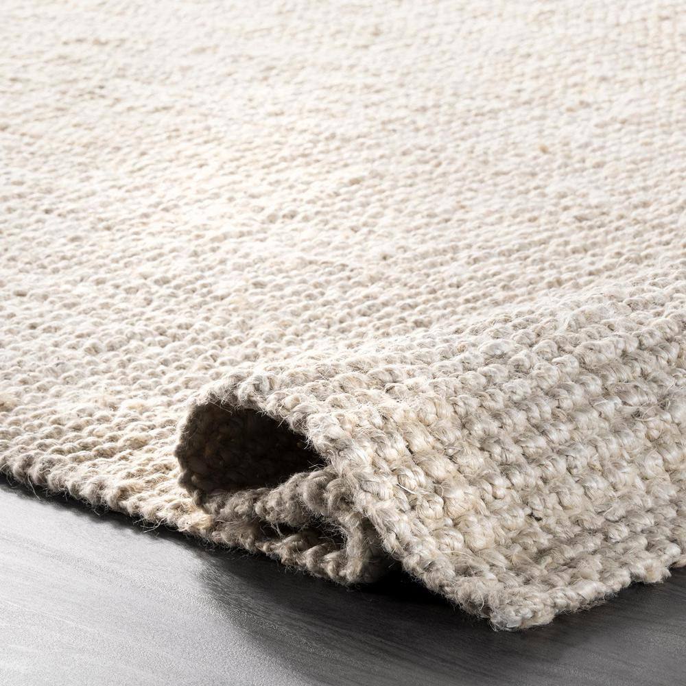 Off White Rectangular Handmade Wool Area Rug 6' x 9'
