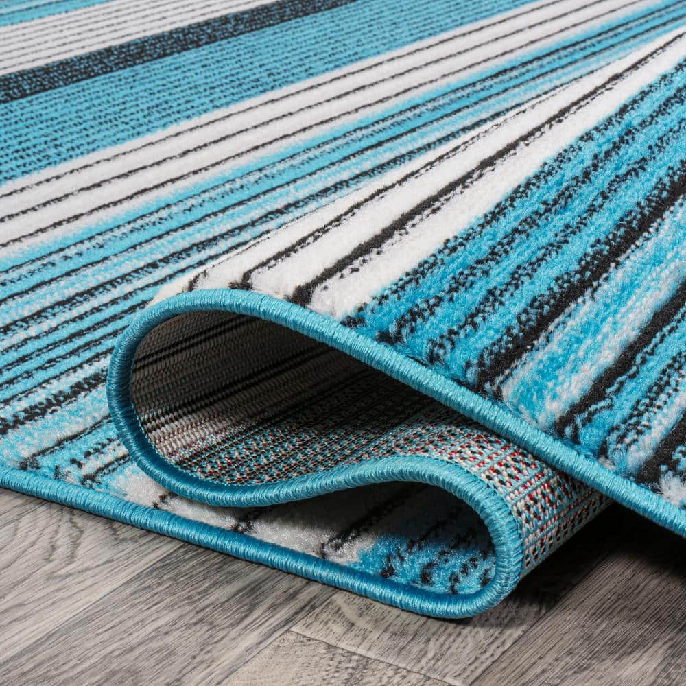 5' x 8' Blue and Navy Gradient Striped Synthetic Area Rug