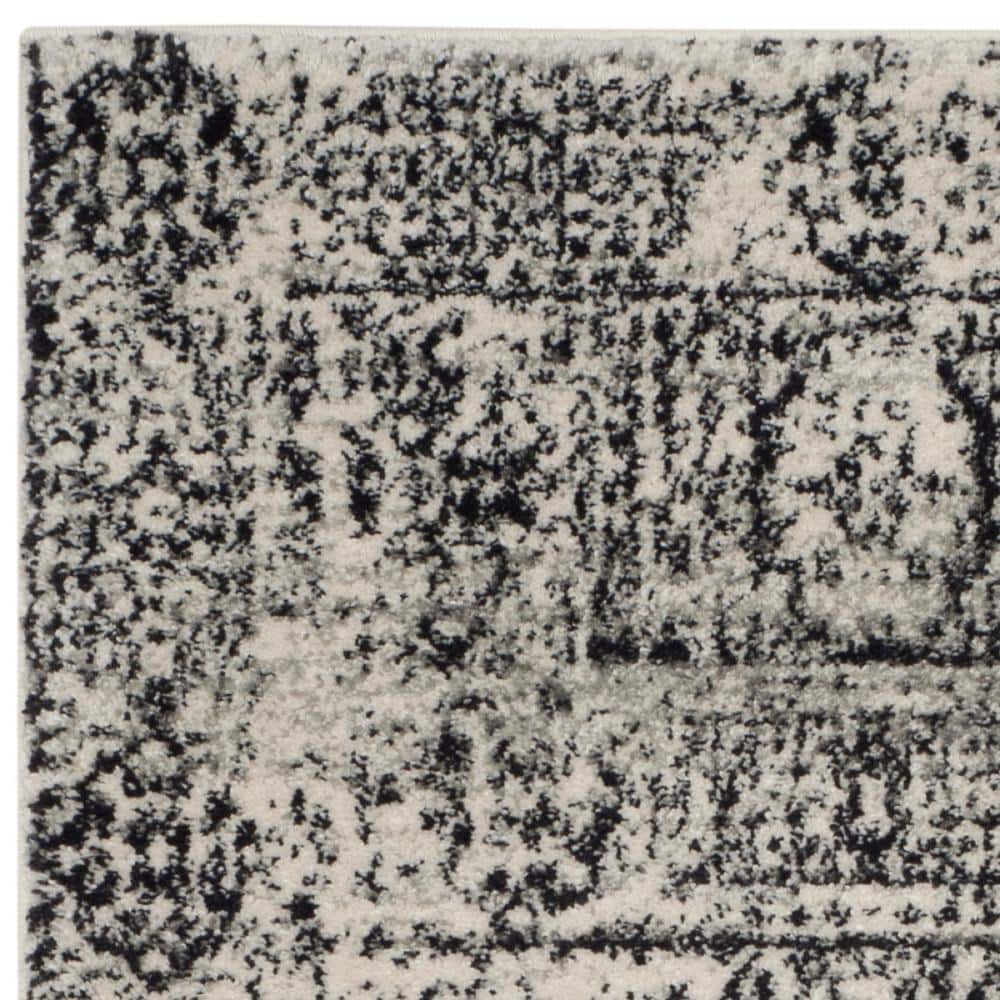 Ivory and Black High Pile Synthetic Area Rug