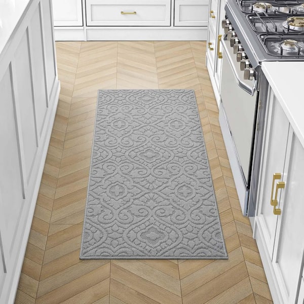 Feya Solid Light Gray 2 ft. x 5 ft. Tufted Medallion Polypropylene Runner Rug