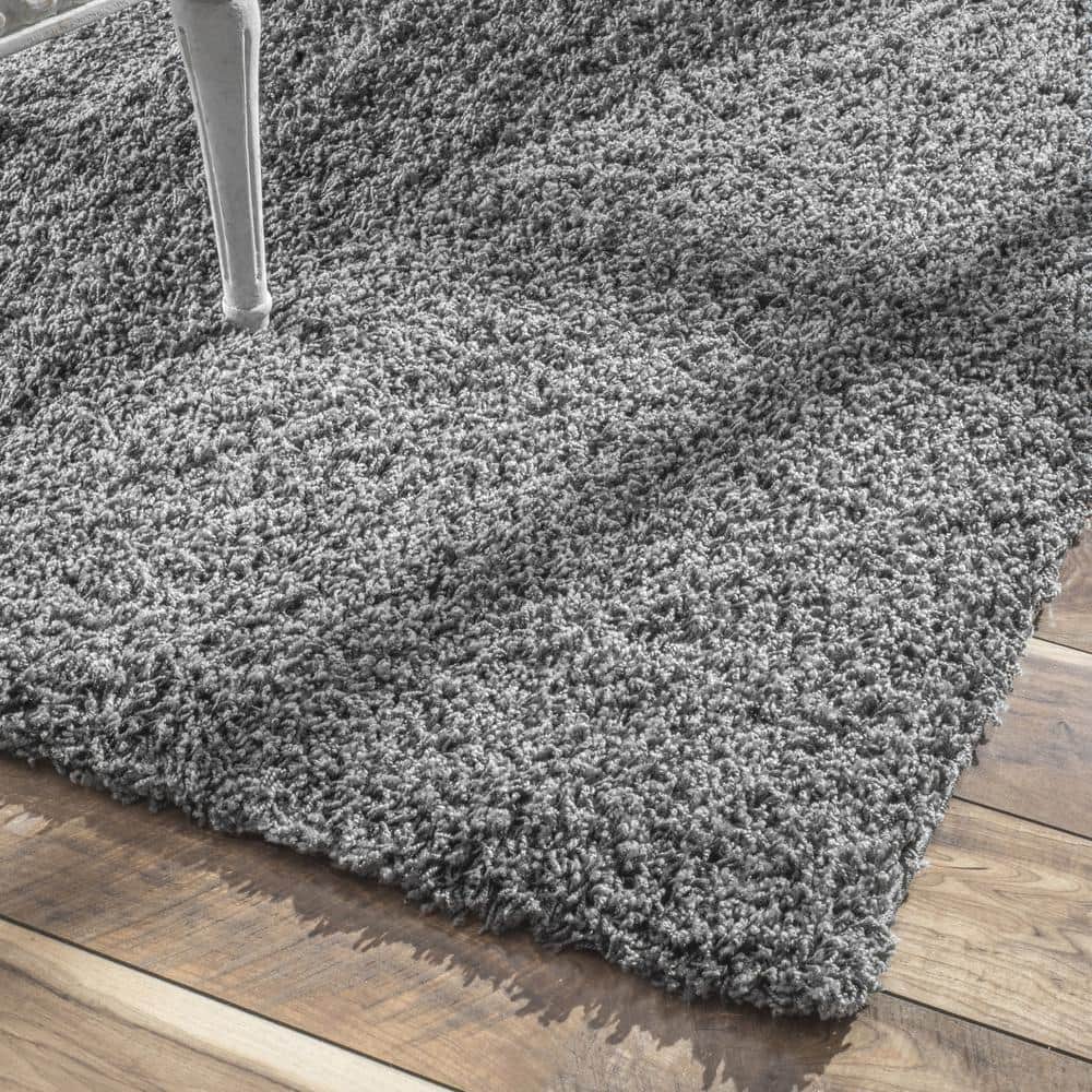 Luxurious Gray Shag 10' x 14' Synthetic Area Rug for High-Traffic Spaces