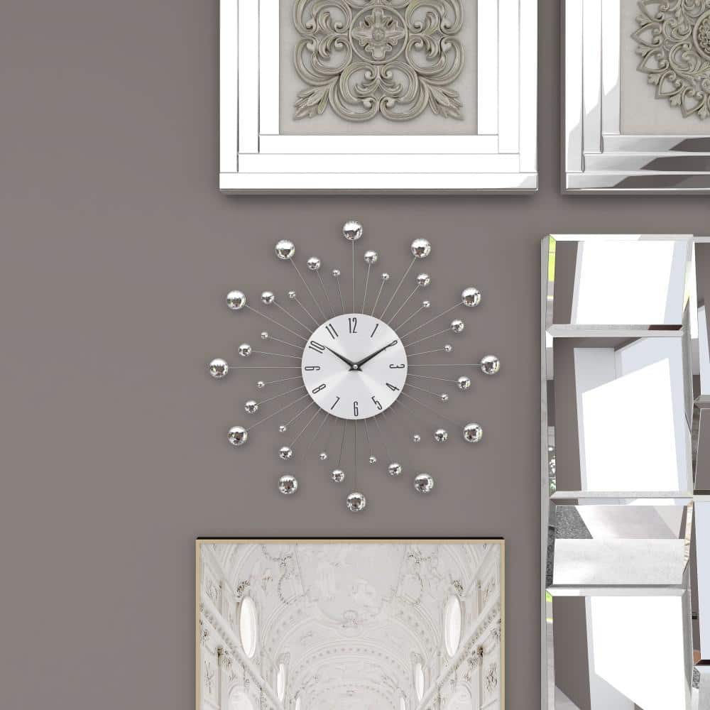 Silver Metal Starburst Wall Clock with Crystal Accents
