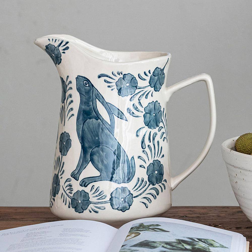 Blue and Cream Stoneware Pitcher with Rabbit and Florals