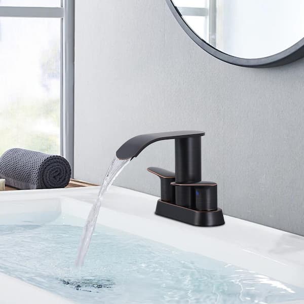 4 in. Centerset Double Handle Waterfall Bathroom Faucet with Drain Kit Included in Oil Rubbed Bronze
