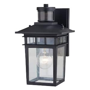 Ridge 6.5 in. W 1-Light Aluminum Black Motion Sensor Dusk to Dawn Outdoor Wall Lantern Clear Glass