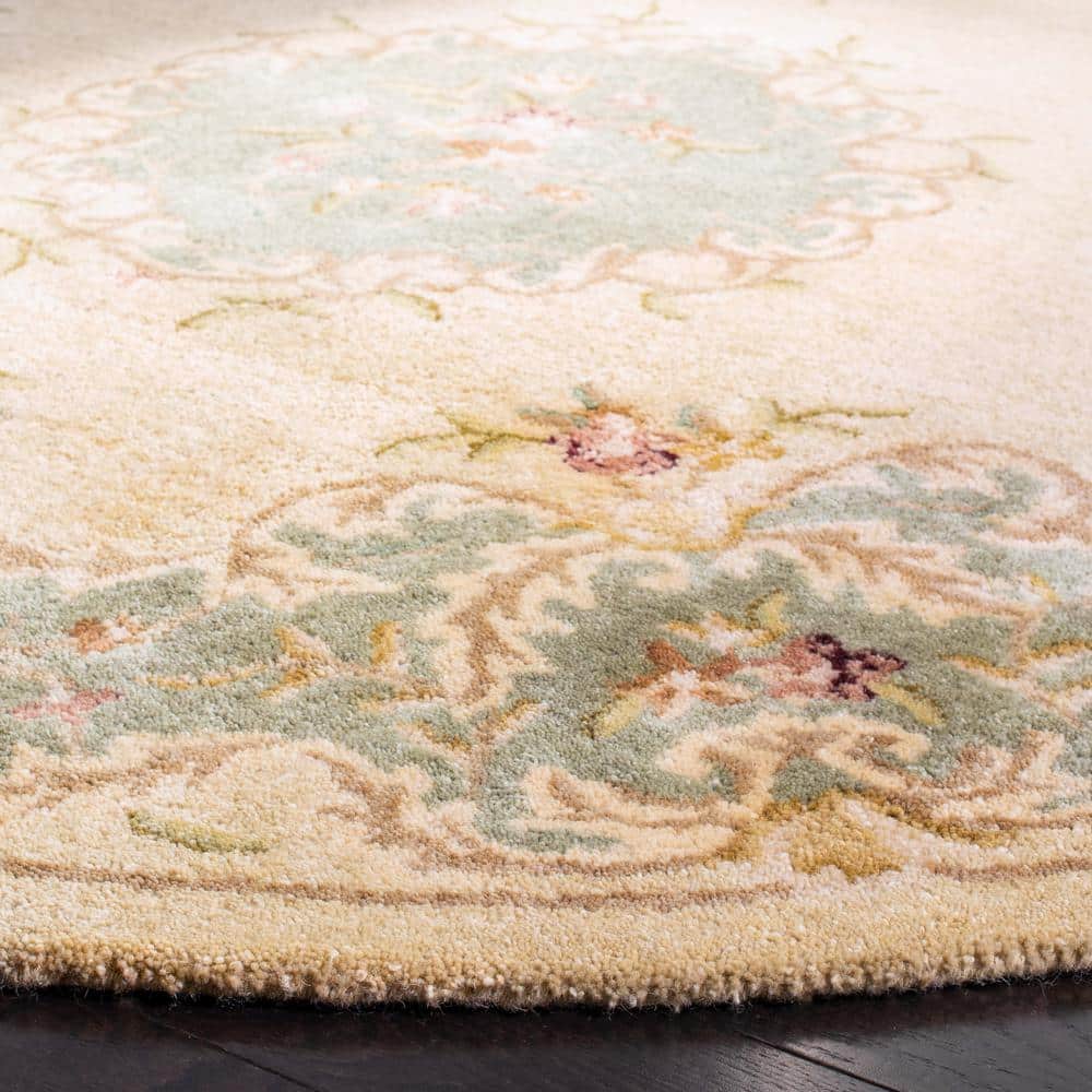 Ivory and Light Blue Round Hand-Tufted Wool Rug