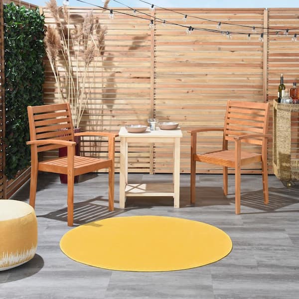 Essentials 4 ft. x 4 ft. Yellow Solid Contemporary Indoor/Outdoor Patio Round Area Rug