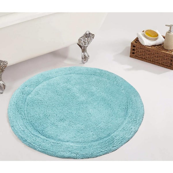 https://images.thdstatic.com/productImages/487f8b43-abaa-4860-83d1-195306d5033d/svn/turquoise-bathroom-rugs-bath-mats-bwa30rtq-64_600.jpg