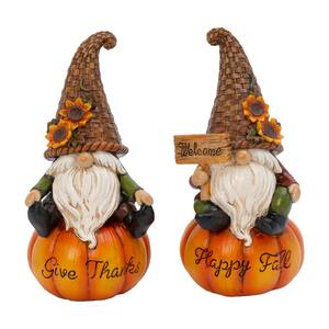 8.8 in. H Resin Harvest Gnomes Sitting on Pumpkins (Set of 2)