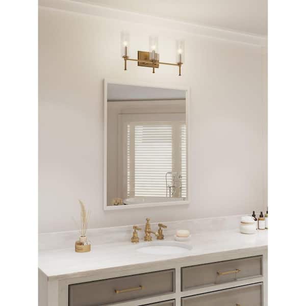 Elara 22.12 in. 3-Light Vintage Brass Vanity Light Clear Glass New Traditional Bath