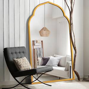 28 in. W x 59 in. H Modern Gold Arch Framed Leaning Mirror