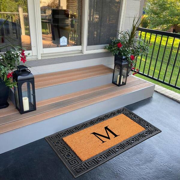 https://images.thdstatic.com/productImages/48dca818-6257-4711-b5dc-0054e9e52eac/svn/black-a1-home-collections-door-mats-rc184nw-m-40_600.jpg