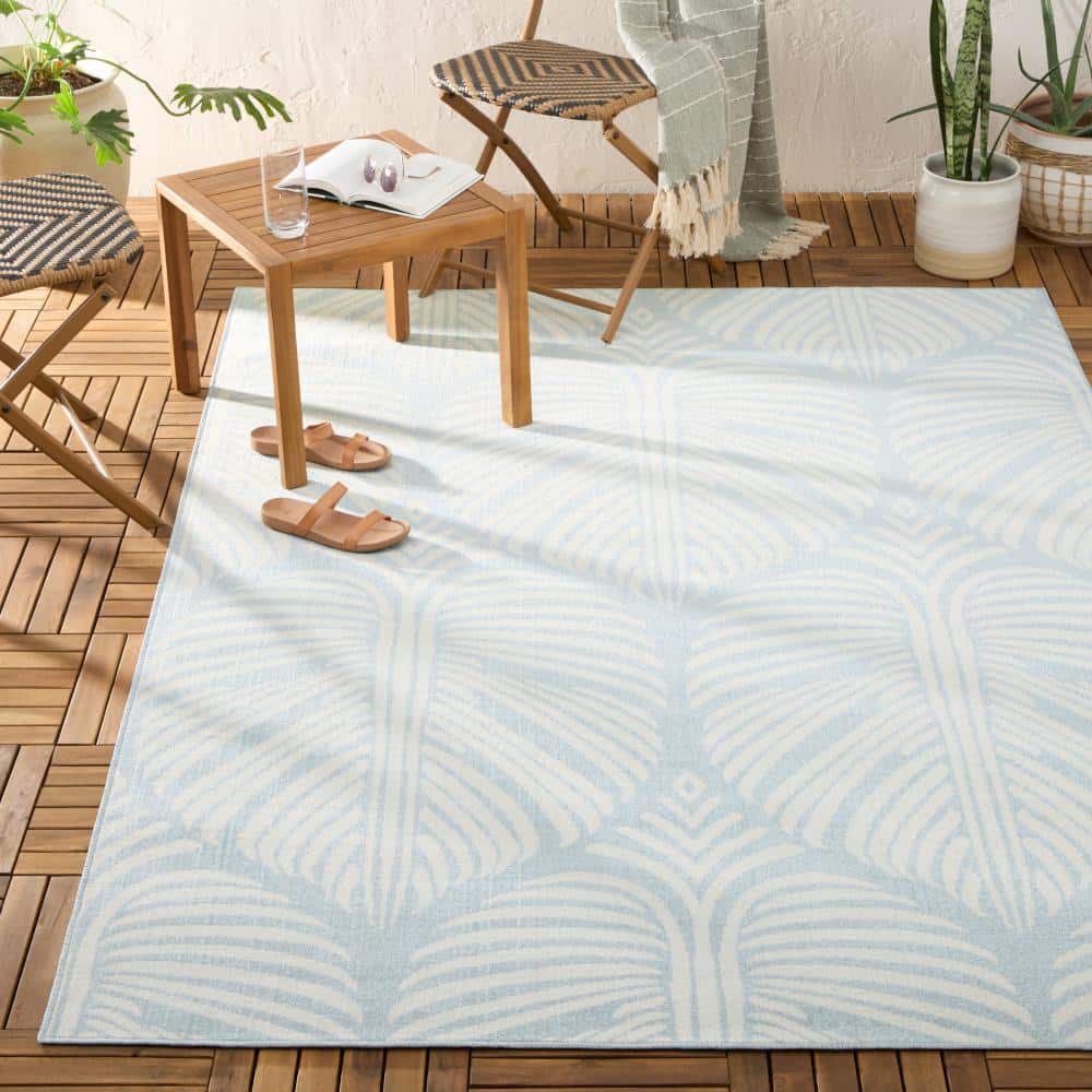 Lanai Blue and Ivory Synthetic Palm Leaves Rectangular Rug