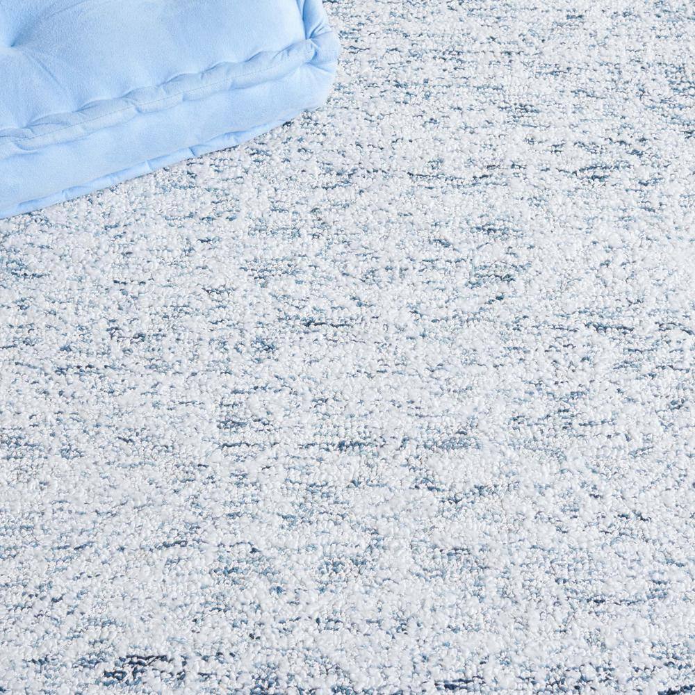 Light Blue Hand Tufted Wool and Synthetic Area Rug, 4' x 6'