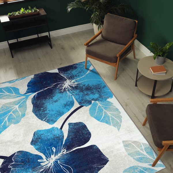 https://images.thdstatic.com/productImages/49066f02-acc2-4f01-a9ad-41f0976a084f/svn/blue-grey-camilson-area-rugs-sol100-blu-5x7-hd-c3_600.jpg