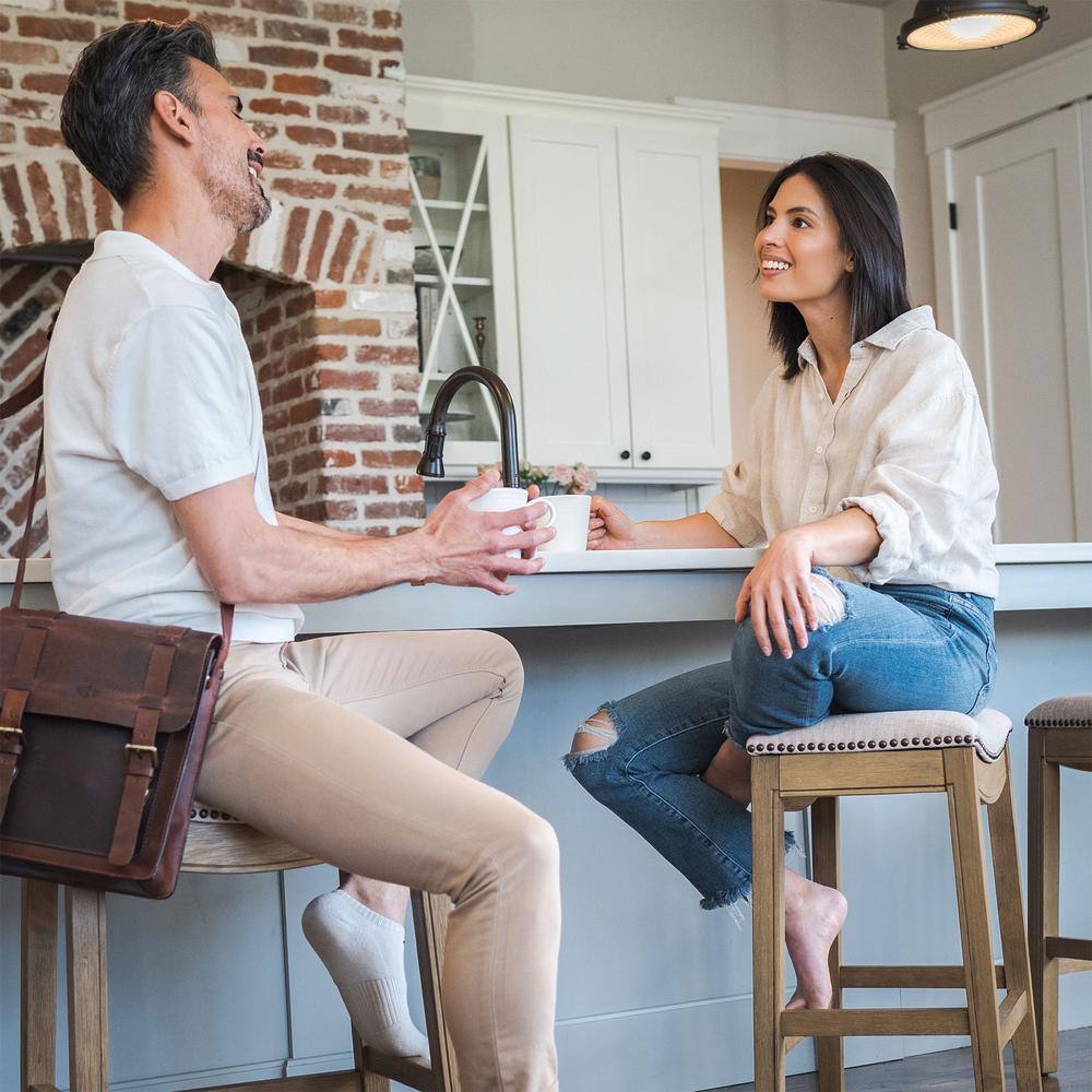 Adrien Brown Backless Saddle Wood Counter Stool