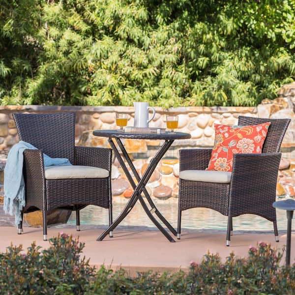 Noble House Malaga Multi-Brown 3-Piece Faux Rattan Round Outdoor Bistro Set with Beige Cushions