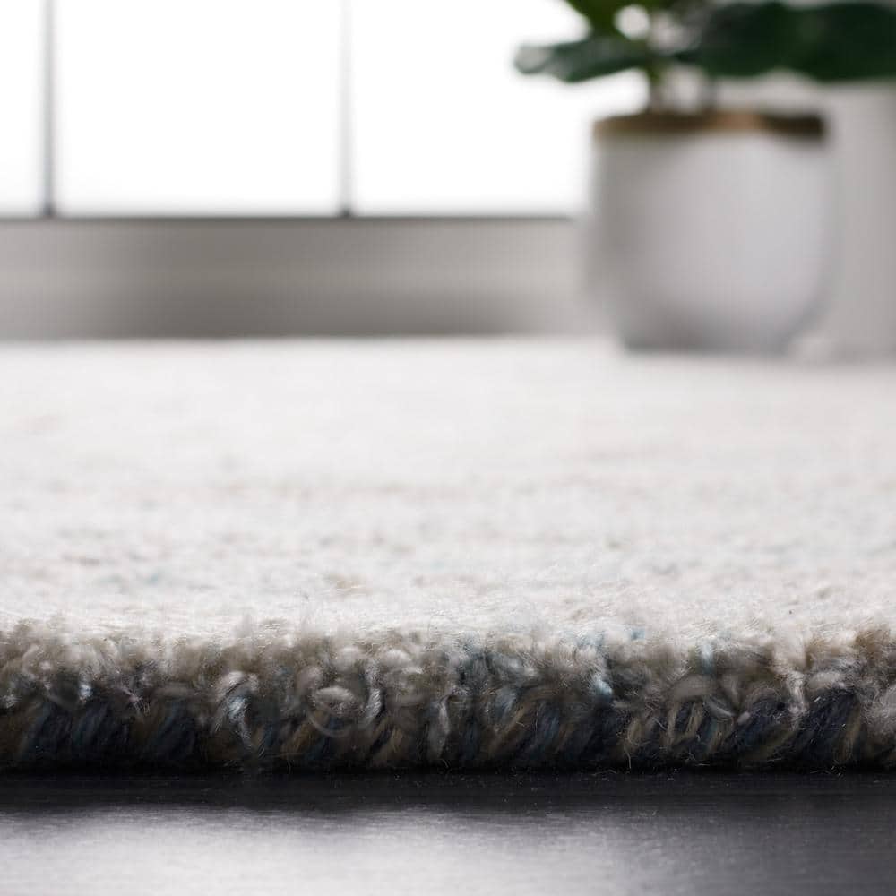 Handmade Blue and Beige Wool Blend Abstract Rug, 6' x 9'