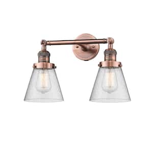 Small Cone 16 in. 2-Light Antique Copper Vanity Light with Seedy Glass Shade