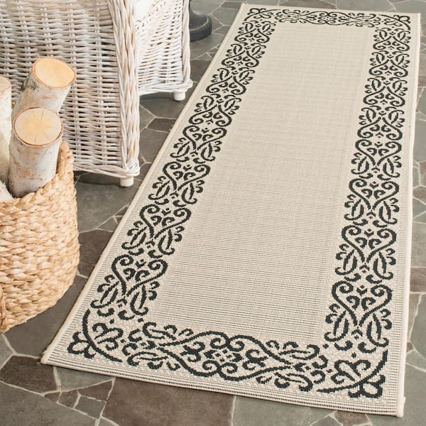 Courtyard Sand/Black 2 ft. x 10 ft. Border Indoor/Outdoor Patio  Runner Rug