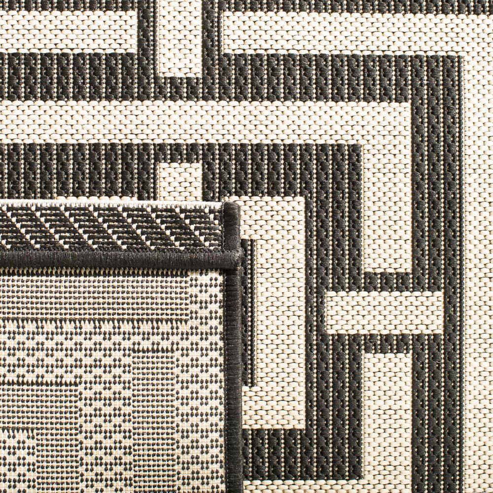 Black and Bone Geometric Synthetic Outdoor Runner Rug