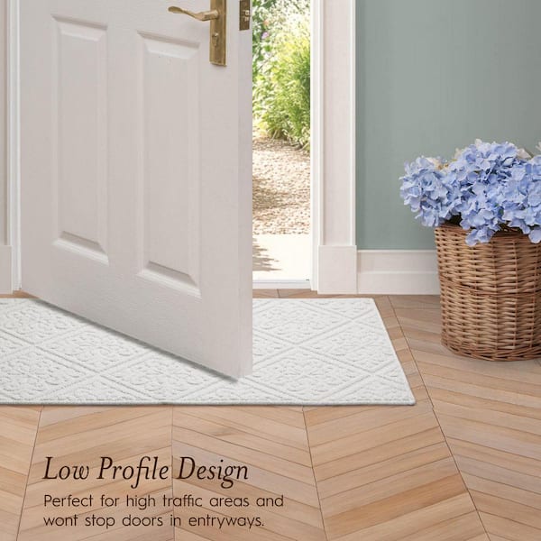 Laura Ashley Austell Solid Ivory 2 ft. x 5 ft. Geometric Runner
